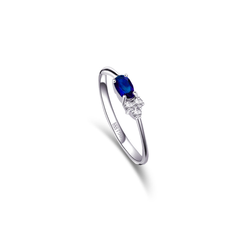 COLOURED OVAL DIAMOND RING
