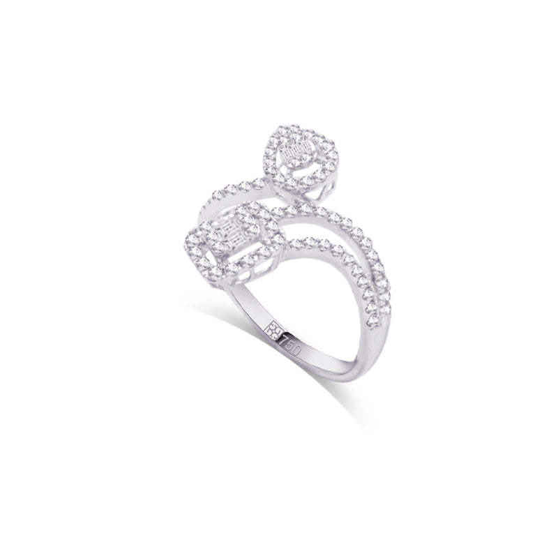 LOOPED EMERALD AND PEAR DIAMOND RING