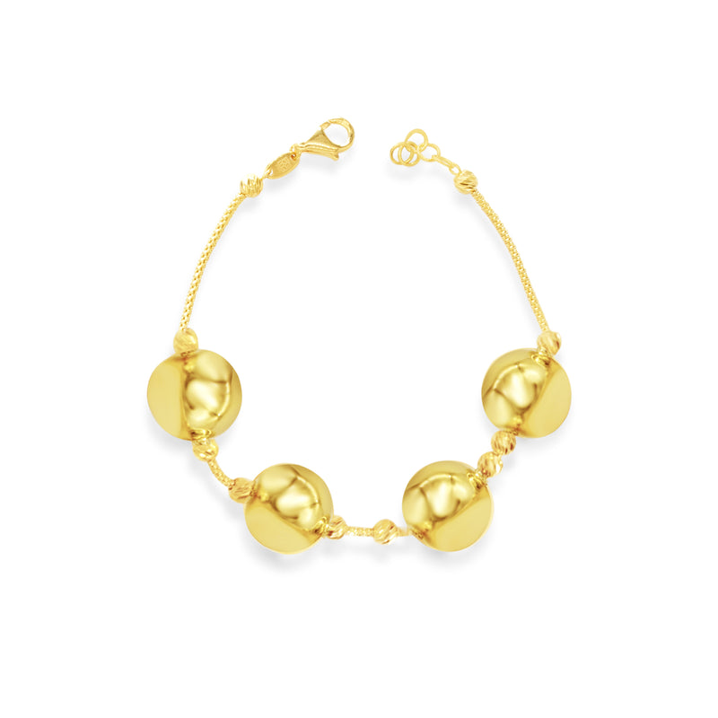 FOUR HUGE SHINNY BALLS GOLD BRACELET