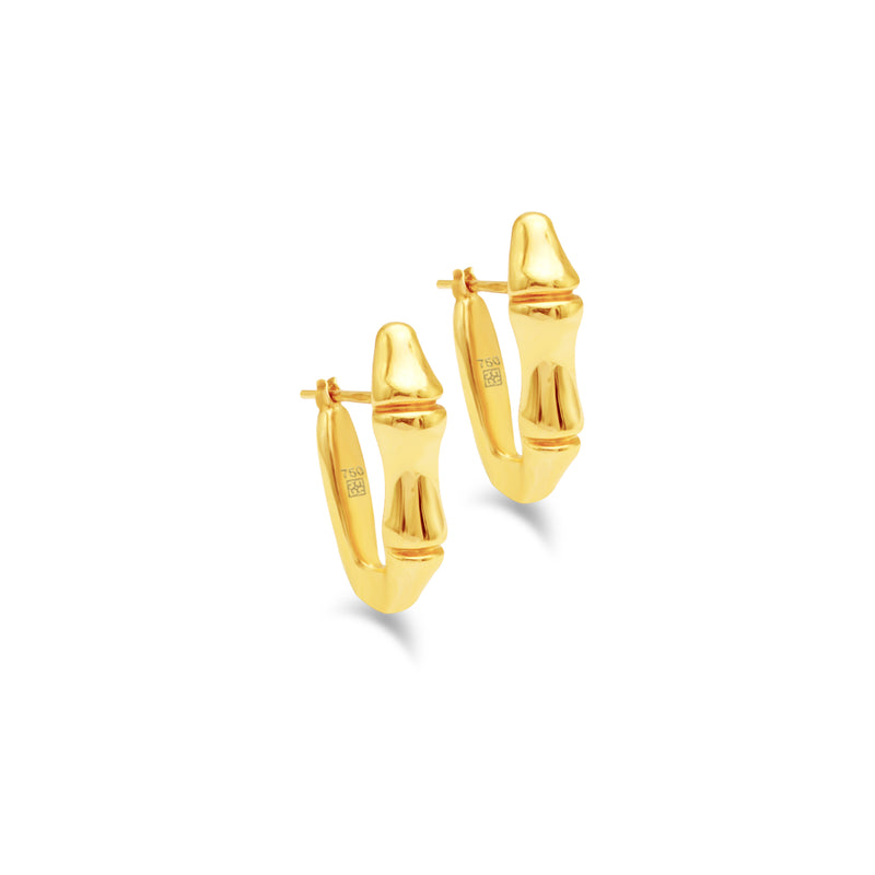 A NAILED HOOP GOLD EARRING