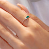 COLOURED OVAL DIAMOND RING