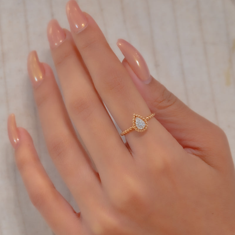 BEADED PEAR DIAMOND RING