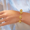 FOUR HUGE SHINNY BALLS GOLD BRACELET