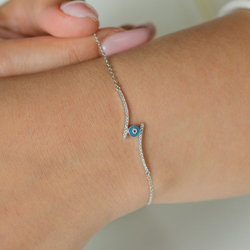 CLASSIC WAVE WITH EVIL EYE DIAMOND BRACELET