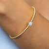 BEADED BANGLE WITH PEAR SHAPE DIAMOND BRACELET