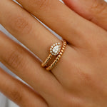 WRAPPED PEAR SHAPED STONES DIAMOND RING