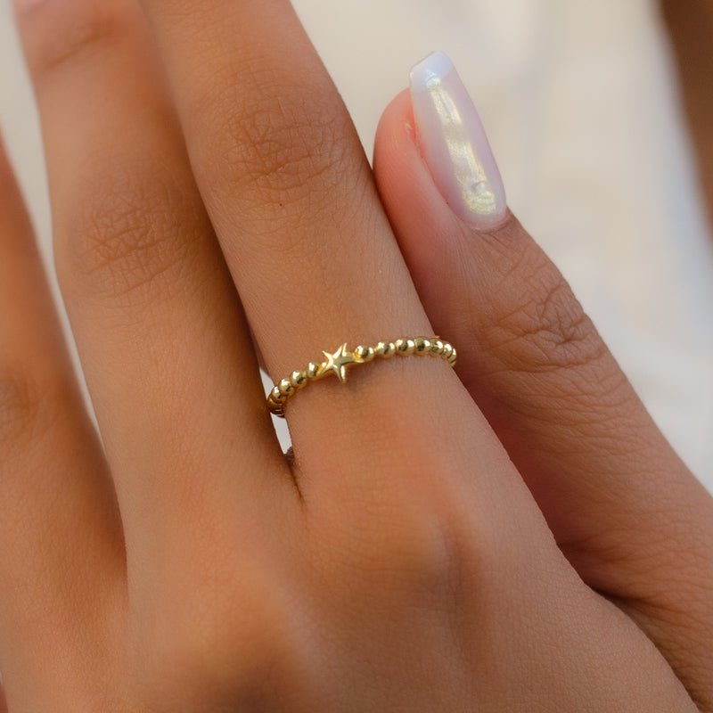 LITTLE  STAR WITH ATTACHED BEADS GOLD RING