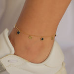 LINE OF DROPPING CIRCLES GOLD ANKLET