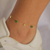 LINE OF DROPPING CIRCLES GOLD ANKLET