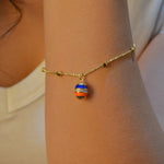 MULTI COLORED DROPPING OVAL GOLD BRACELET