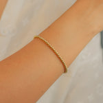 SHINNY CONNECTED BEADS GOLD BRACELET