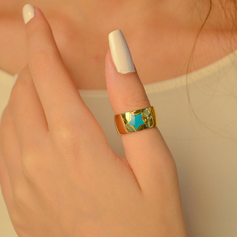 TURQUOISE STAR ON A WIDE BAND GOLD RING